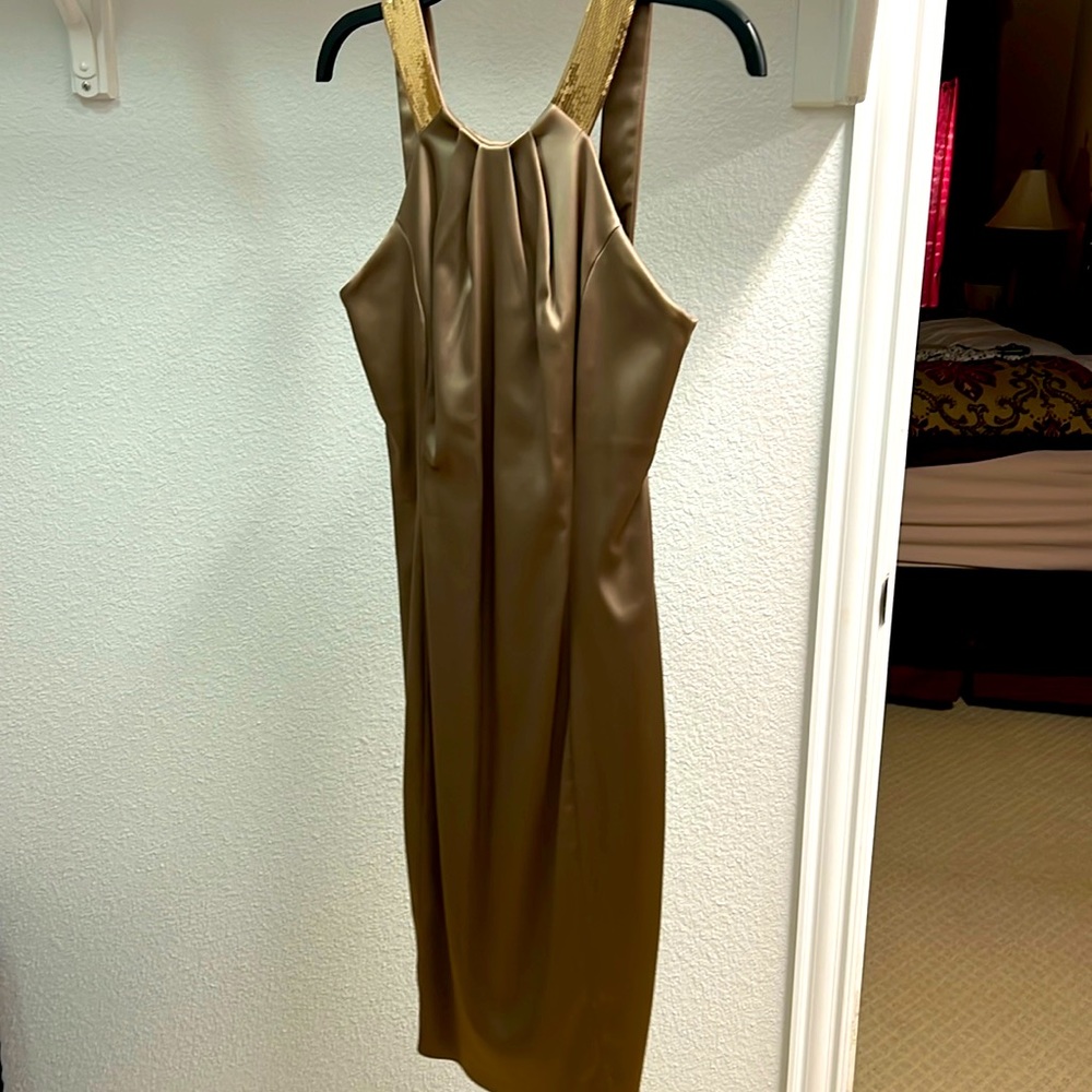 Calvin Klein gold dress size 4. Worn 2 times.